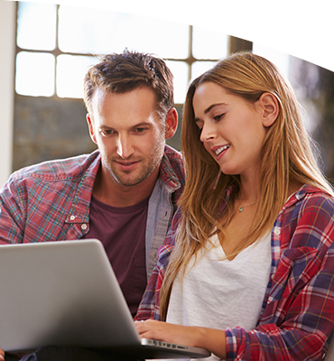 A couple using a laptop computer