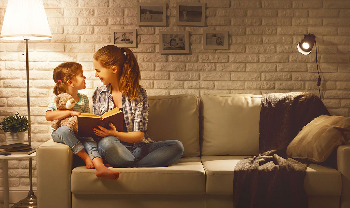 Mother and daughter reading a book